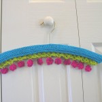 Hanger cover with vines and flowers